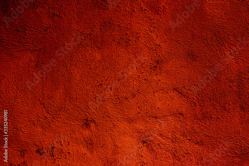 Red colored wall texture background with textures of different shades of red