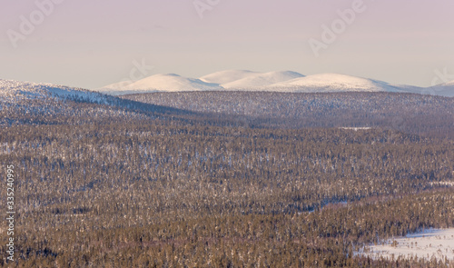 winter landscape with mountains in Lapland, Finland