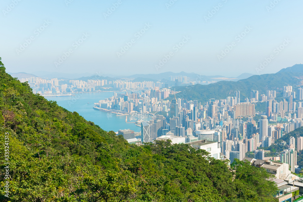 Hong Kong's beautiful skyline. Victoria Peak view on a sunny day. Hong Kong, China. Hong Kong Island & the South China Sea. 