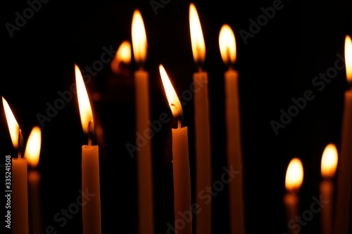 Burn candles in church