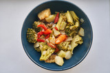 Steamed vegetables. Boiled vegetables in a plate. Broccoli, cauliflower, zucchini, pepper. Healthy food