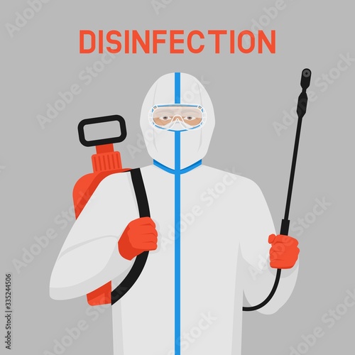 Doctor in protective suit with disinfection equipment