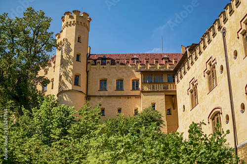 Detail of one of the yellow facades of Hohenschwangau Castle. Photograph taken in Schwangau, Bavaria, Germany.