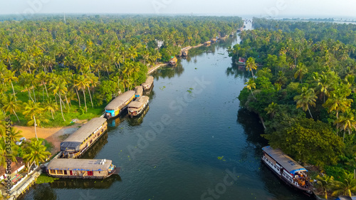 Aerial View of Traditional Indian houseboat near Alleppey on Kerala backwaters photo