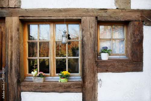 Rustic wood windows in an old traditional house