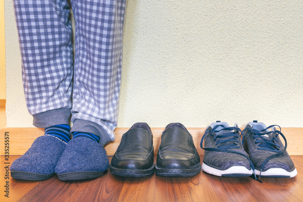 Footwear to stay at home and pajamas with upper space for text