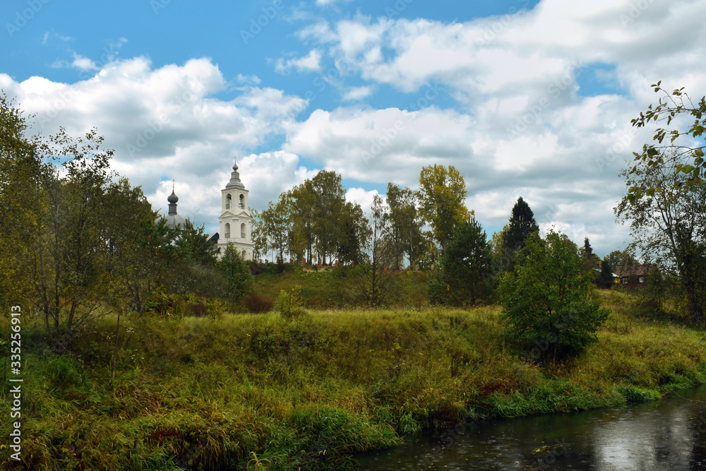 Fototapeta premium Orthodox Church in the summer forest