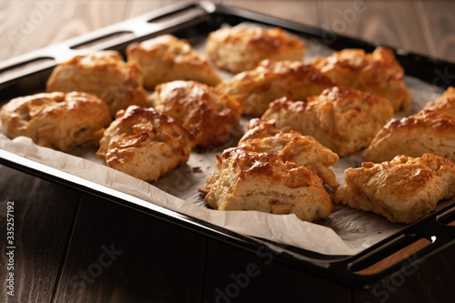 Tasty, fragrant and tender scones with apples from the oven close-up
