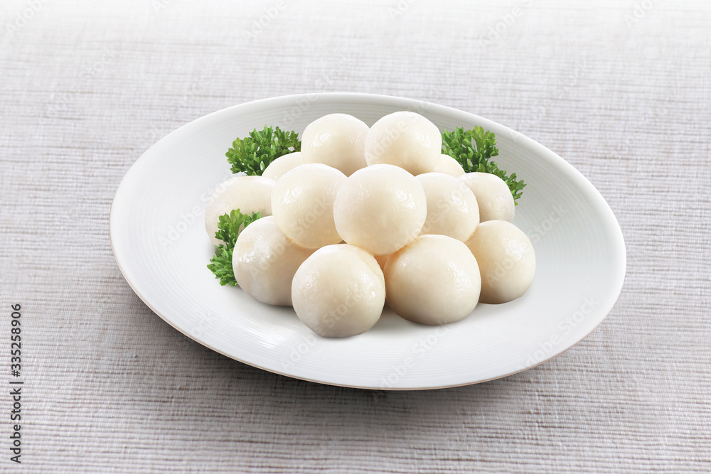 Asian traditional snacks fish balls on plate Asian traditional snacks fish balls on plate