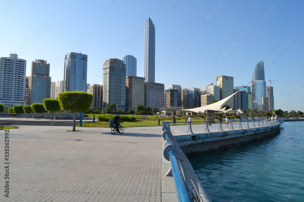 View of Abu Dhabi Cornish during the day tome with beautiful blue sky and blue sea. Luxury lifestyle, tourism, United Arab Emirates, Abu Dhabi life,