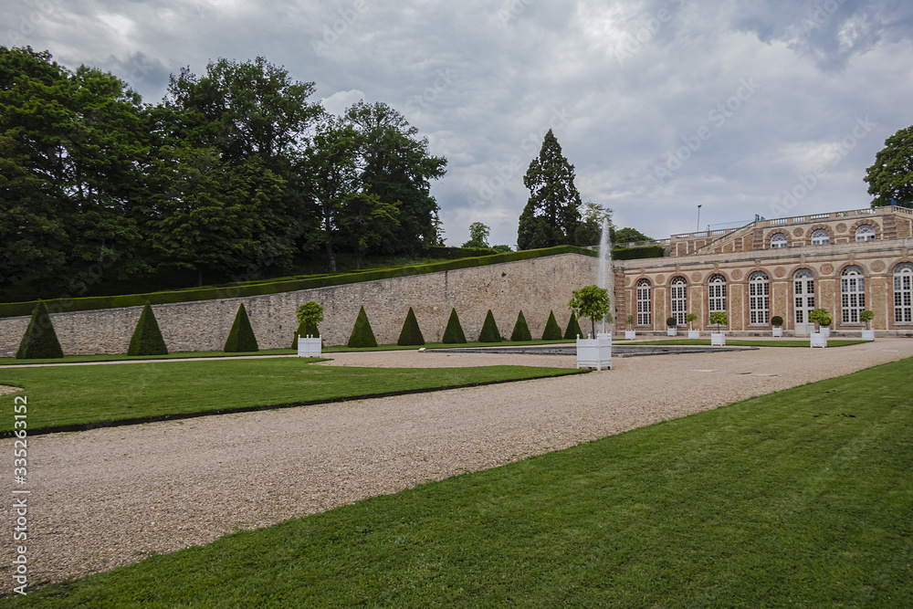 Obraz premium Picturesque Orangery (L'Orangerie de Meudon, XVII century) in Meudon. The Orangery - remain of the former old castle of Meudon. Meudon is a municipality in the southwestern suburbs of Paris, France.