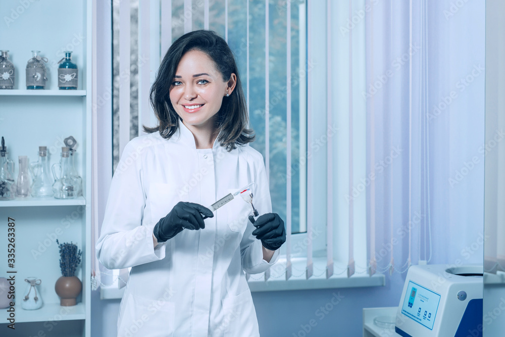 Doctor's hands with a syringe injection. Safe and effective vaccine against flu and covid-19 virus Doctor's hands with a syringe injection. Safe and effective vaccine against flu and covid-19 virus