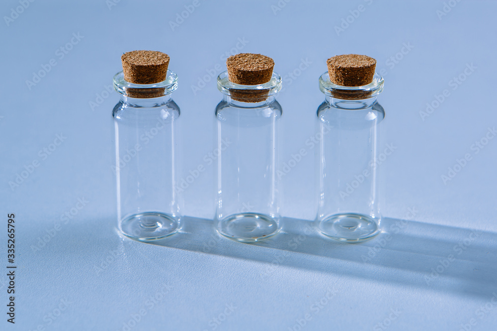 three empty beakers or test tubes three empty beakers or test tubes