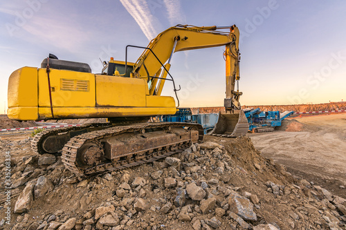 Wallpaper Mural Excavator on the road construction works. Machinery needed for construction Torontodigital.ca