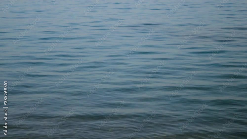 Blue sea water surface at sunset, abstract seascape background and rippling sea water waves in Egypt at Ras Mohammed National Park.