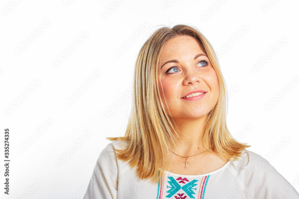 Isolated portrait of a beautiful young woman with blond hair. Portrait of a smiling girl. Isolated portrait of a beautiful young woman with blond hair. Portrait of a smiling girl.