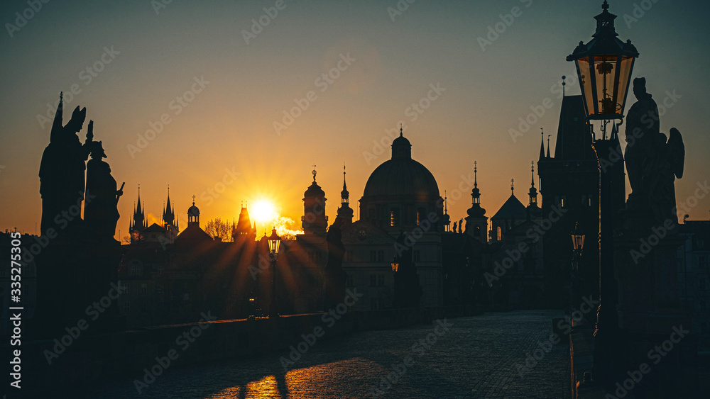 Sunrise from the Charles bridge, the city of Prague