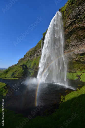 waterfall in Iceland with rainbow