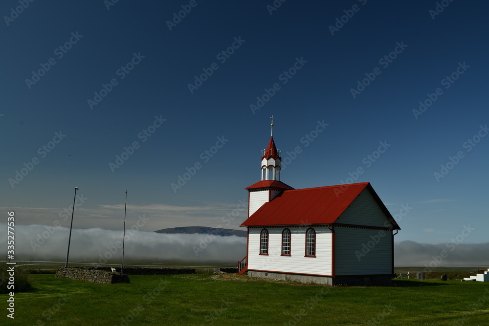 church in the mountains in Iceland church in the mountains in Iceland