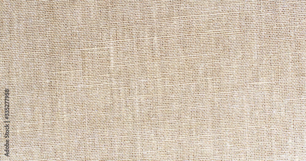 Natural linen material textile canvas texture background Natural linen material textile canvas texture background