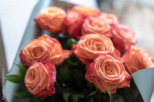 Wilting bouquet of yellow roses