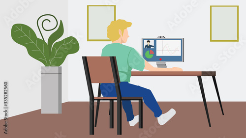 Concept working from home. Men study and learn various jobs via the internet at home. With a large screen on the table And a plant pot beside the wall.