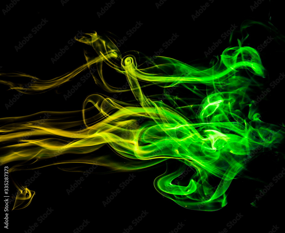 Colored smoke on black background Colored smoke on black background