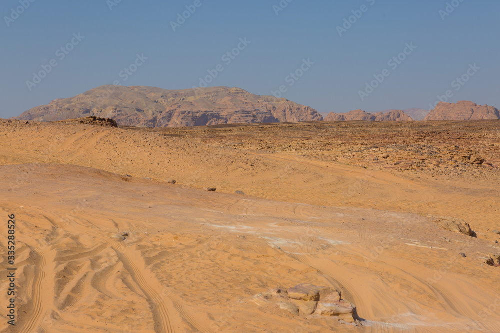 Coloured Canyon is a rock formation on South Sinai (Egypt) peninsula. Desert rocks of multicolored sandstone background. Coloured Canyon is a rock formation on South Sinai (Egypt) peninsula. Desert rocks of multicolored sandstone background.