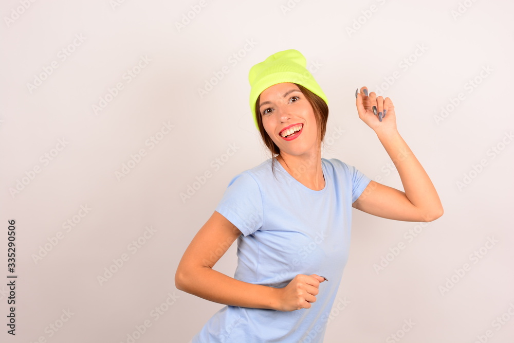 joyful woman in a yellow hat