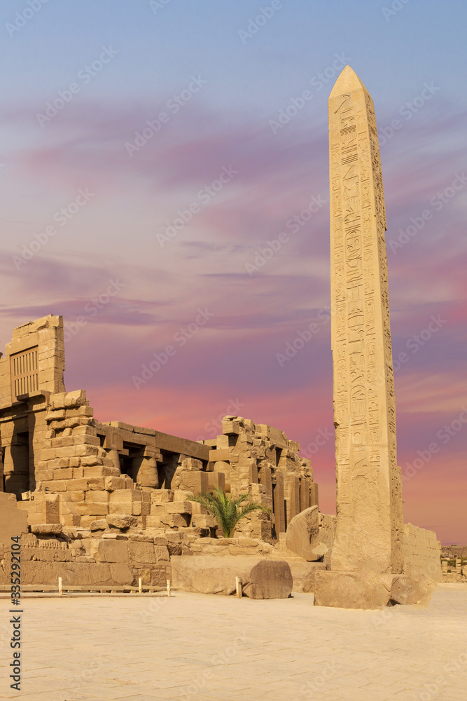 Ancient ruins of the Karnak Temple in Luxor (Thebes), Egypt. The largest temple complex of antiquity in the world. UNESCO World Heritage.