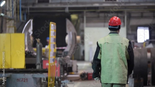 A man walks at a factory in Russia