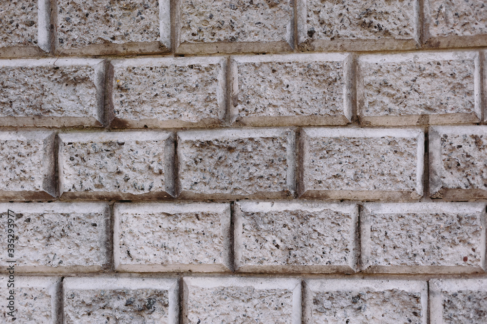 Fototapeta premium House wall element revetted with a natural stone.