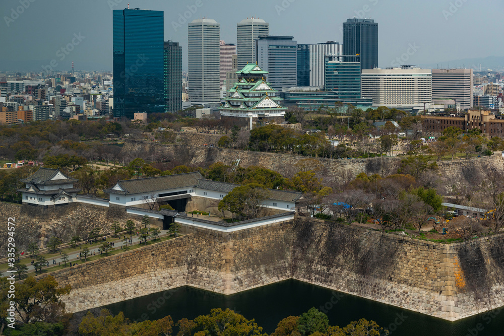 Fototapeta premium Aerial view of Osaka Castle and city skyline, Japan