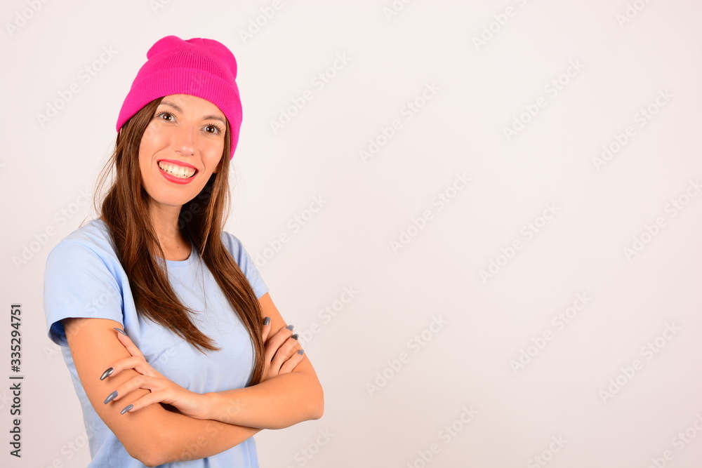 place  free woman smiling in a pink hat in a blue shirt