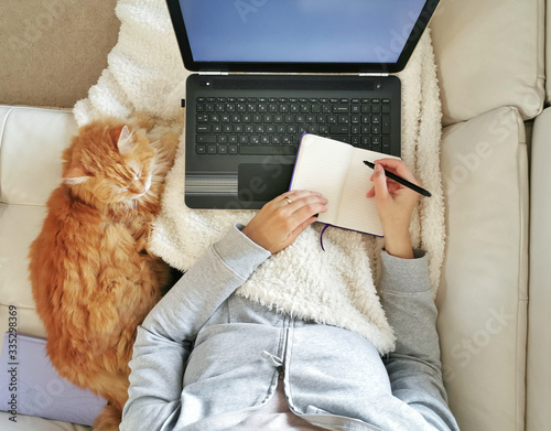 Woman working from home  with her laptop