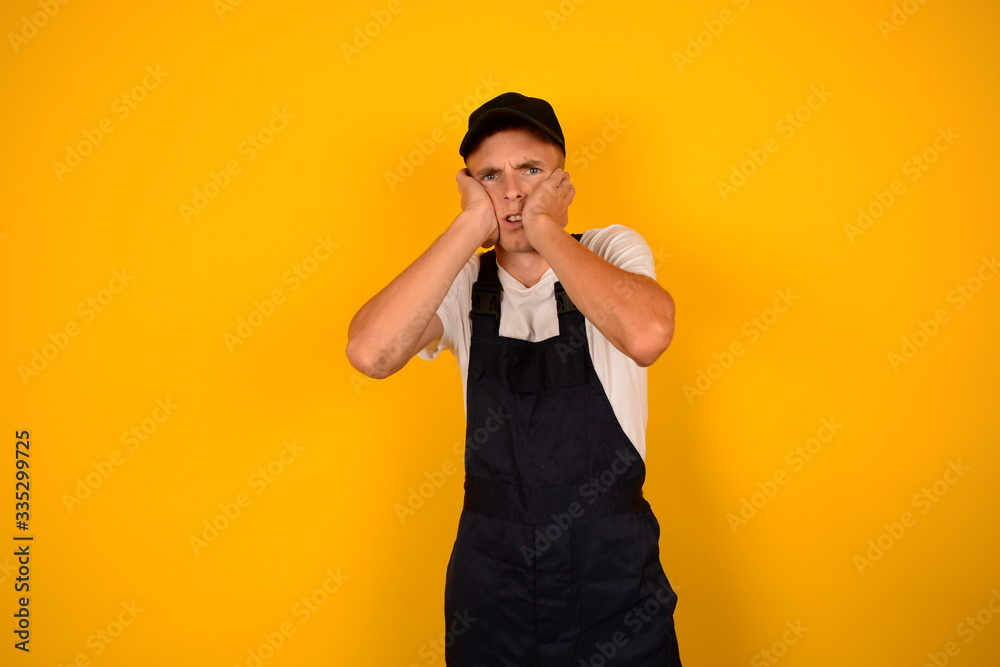 courier man tired holding hands over face courier man tired holding hands over face