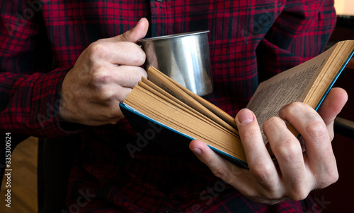 man is reading a book