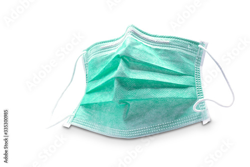 Doctor mask green for protect Covid 19 or Corona Virus,were to save your life and from air pollution isolated on white background with clipping path.