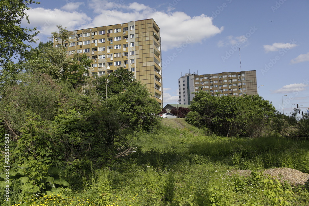 Plattenbau houses on a hill next to the Vistula River in Warsaw Plattenbau houses on a hill next to the Vistula River in Warsaw