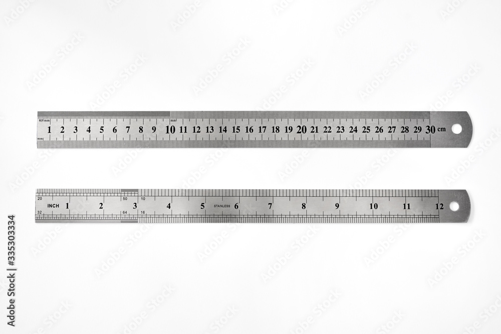 Stainless metal rulers on white background Stainless metal rulers on white background