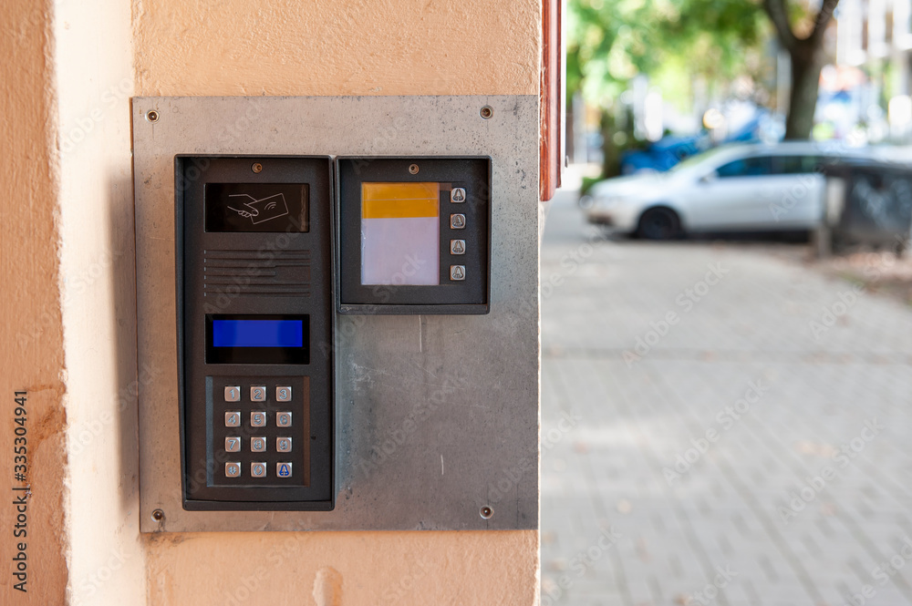 Modern digital intercom with numeric keypad and passcard sensor Modern digital intercom with numeric keypad and passcard sensor