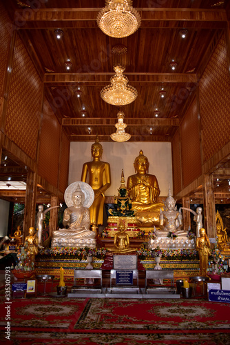 Golden statue of buddha in temple, Thailand 