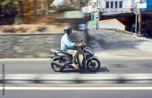 Fast moving moped with panning technique