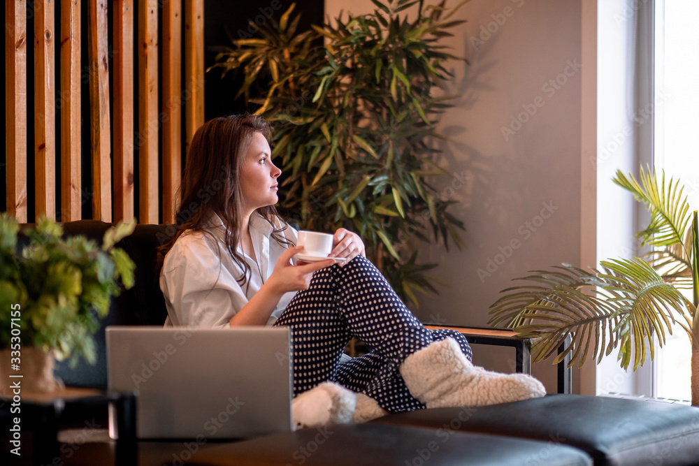Obraz premium girl working at home, quarantine, safe work, remote work