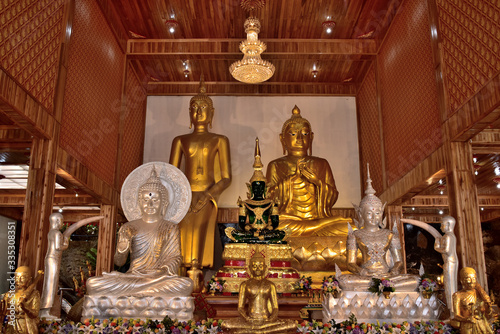 Golden statue of buddha in temple, Thailand 