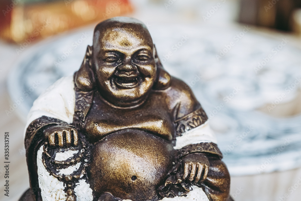 Petite statue du bouddha souriant Stock Photo Adobe Stock