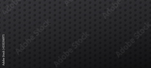 Black background with round holes or polka dot