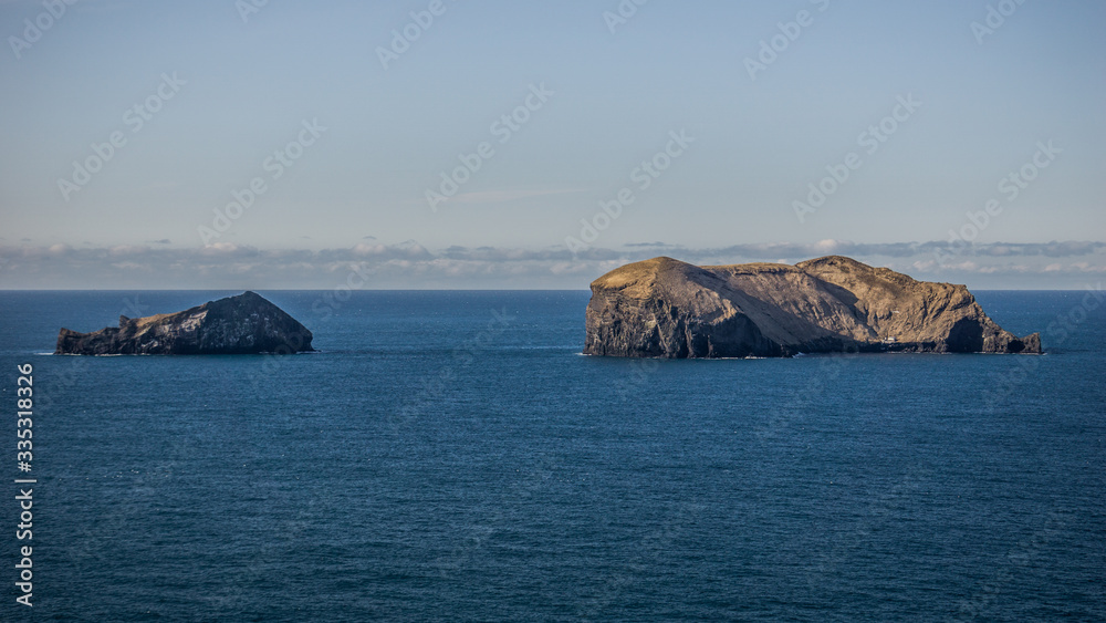 The landscape of Vestmannaeyjar archipelago, a group of islands just south of mainland Iceland.