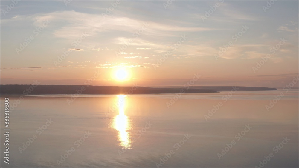 Panoramic shot of forest lake at sunset. Beautiful dawn shot on a lake in Russia Panoramic shot of forest lake at sunset. Beautiful dawn shot on a lake in Russia