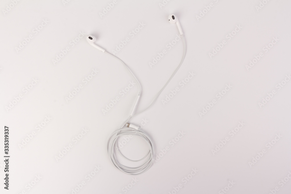White headphones with headset on white isolated background White headphones with headset on white isolated background